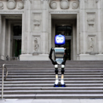 chat robot standing on the steps of the new york city public library